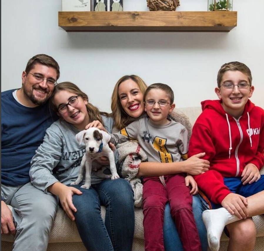 Family pic with dog on couch