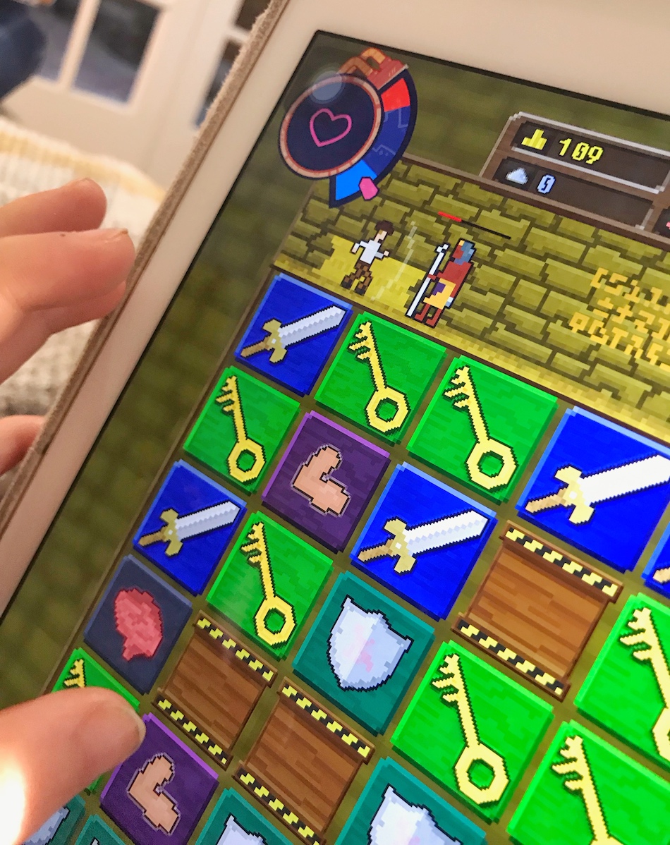 Boy playing Mightier app - screen close up